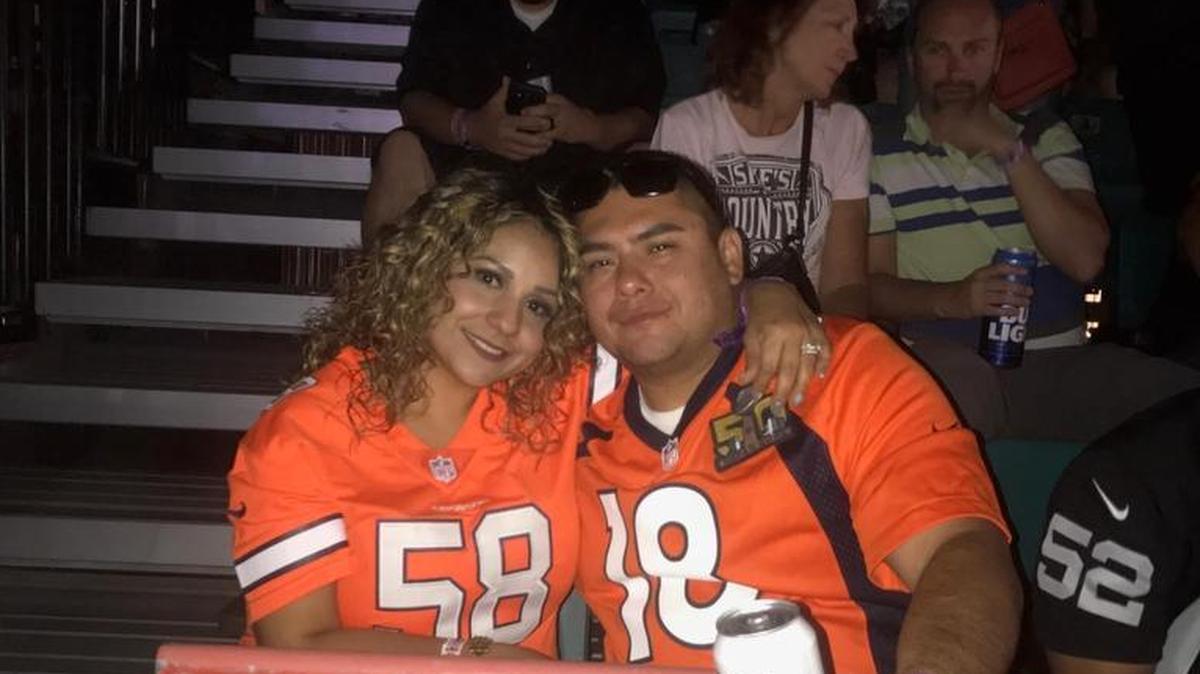 Maria and Ronnie Reyes of Hanford sit in the bleachers at the Route 91 Harvest Music Festival in Las Vegas on Oct. 1, 2017. Gunfire began not long after this picture was taken.