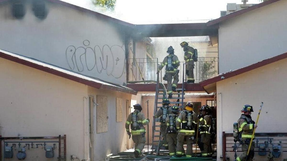 The cause of Tuesday’s fire on South Woodrow Avenue remains undetermined. Two people detained were released by investigators.