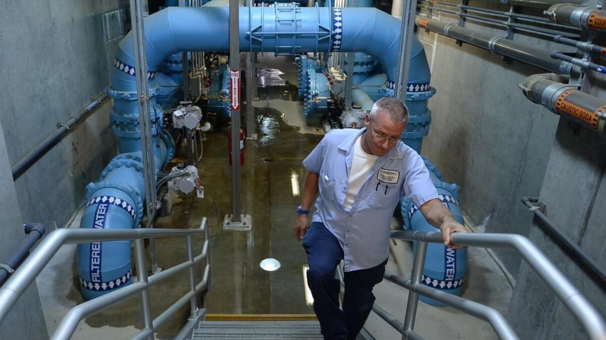 System operator Brad Hoagland in the city of Fresno’s water treatment plant on Chestnut near Behymer in northeast Fresno in 2013. The northeast plant handles 30,000 acre-feet a year; a planned plant southeast of Fresno will be able to handle 80,000 acre-feet of river water annually.