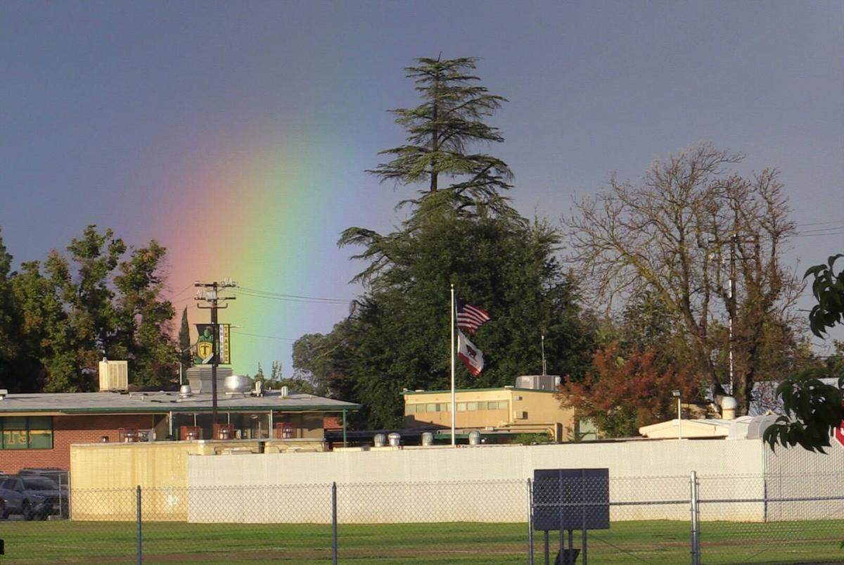A Rainbow springs up near Teague Elementary School in northwest Fresno on Tuesday afternoon.