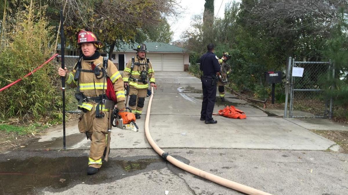 Firefighters quickly extinguished a fire at a house converted into a business in central Fresno on Saturday, Dec. 26, 2015. The cause of the fire is under investigation.
