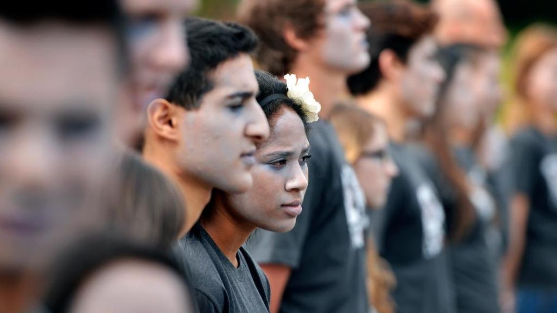 Samantha Earl, 16, stands alongside other Living Dead actors as a symbol of those lost the during Every 15 Minutes event held outside Clovis High School in this 2013 photo. The event simulated a two-vehicle accident caused by drunken driving.