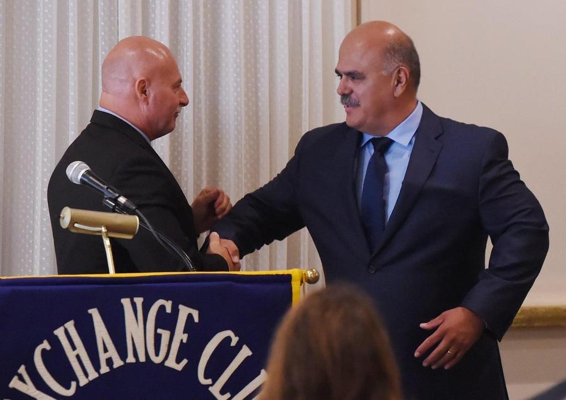 Fresno Chief of Police Jerry Dyer, left, honors Fresno Police Officer Gil Holguin, right, at the Exchange Club of Fresno’s Top Cop luncheon Thursday, May 6, 2019 in Fresno. Holguin represented the Fresno Police Department. Officer Traci Gallian, who could not attend, represented the California Highway Patrol, and Detective Jesse Gloria represented Fresno County Sheriff’s Office.