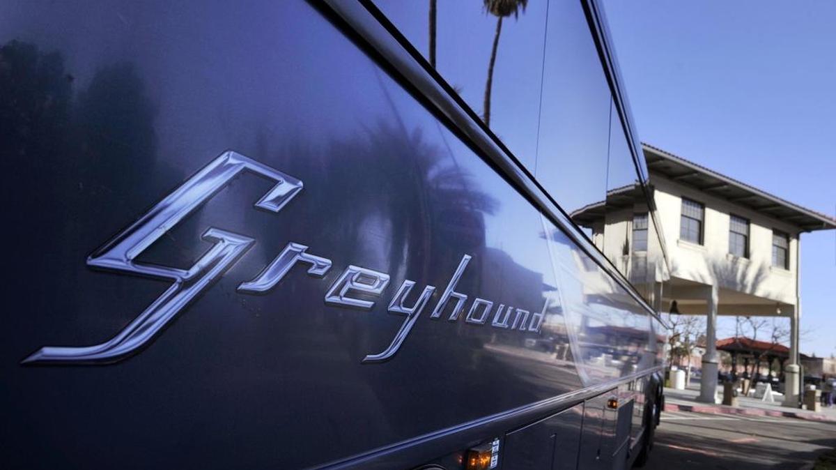 A Greyhound bus is parked in front of the Santa Fe Passenger Depot on Tulare Street for a ribbon-cutting event Tuesday, Dec. 15, 2015 marking Greyhound moving its bus terminal to the Amtrak station near Fresno City Hall. Edward Vanheel, district manager for Greyhound, said service would begin Thursday, Dec. 17. Greyhound’s bus terminal was previously located on H Street near Chukchansi Park.