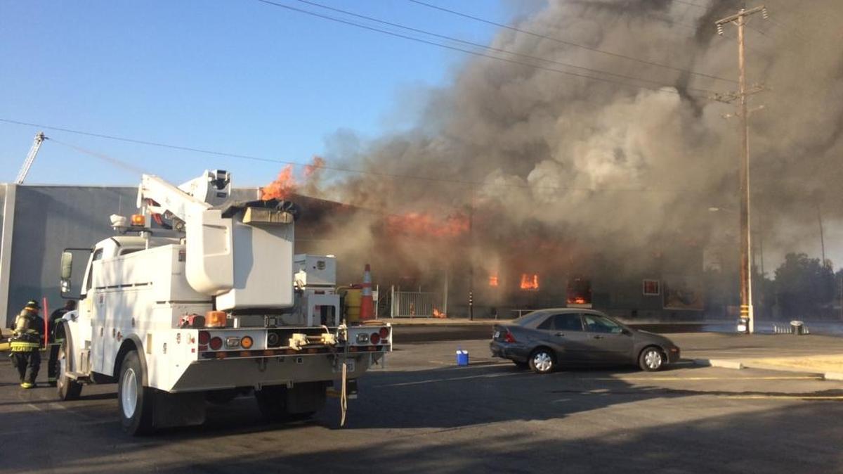 A packing shed burns in Lindsay on Friday.