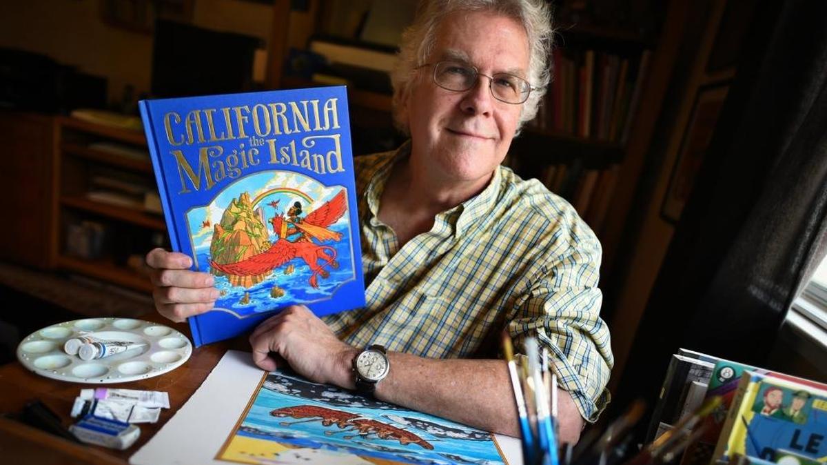 In this file photo, Doug Hansen shows his book, "California, the Magic Island." JOHN WALKER/THE FRESNO BEE April 26, 2016