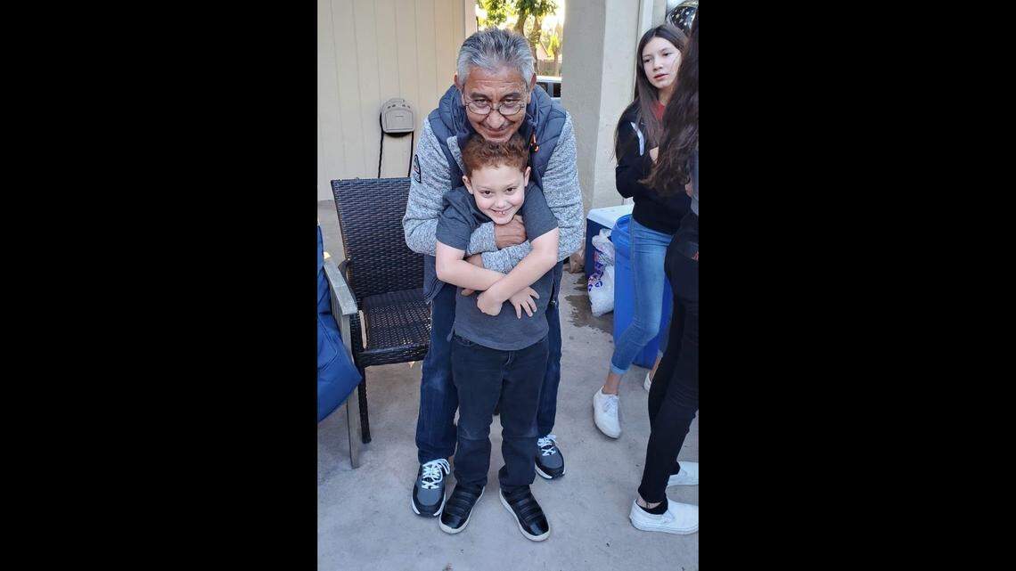 Jesus Salazar is photographed with his grandson Landon ‘Canelo’ Castillo in an undated photo. Salazar, 66, died while working at Pitman Family Farms in Sanger, California on May 6, 2023.