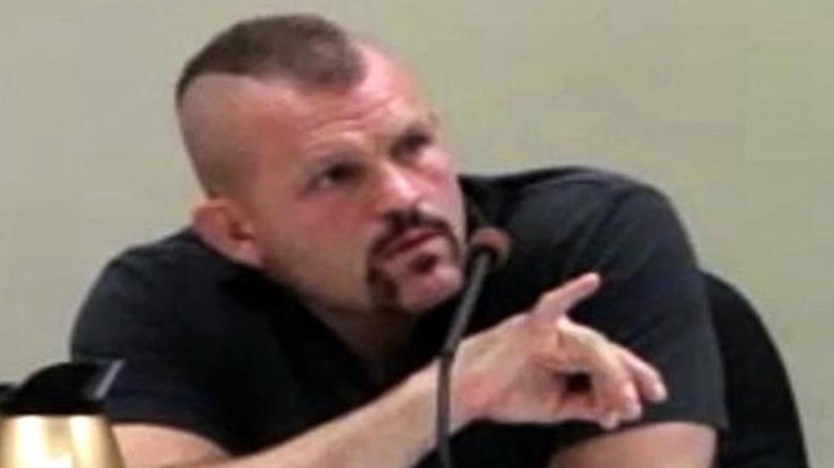 
Chuck Liddell traces his signature during court hearing.
