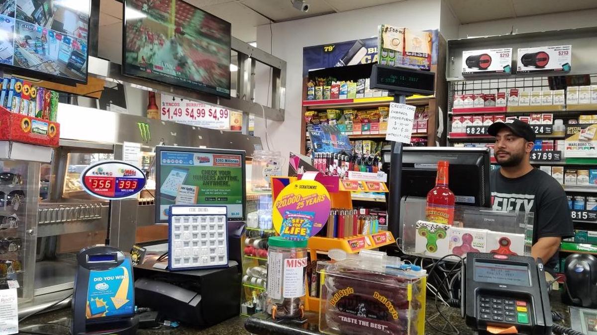 Owner Blou Singh has seen more customers come in to buy lottery tickets at Tony’s One Stop on Ventura Avenue since the Mega Millions and Powerball jackpots have soared.