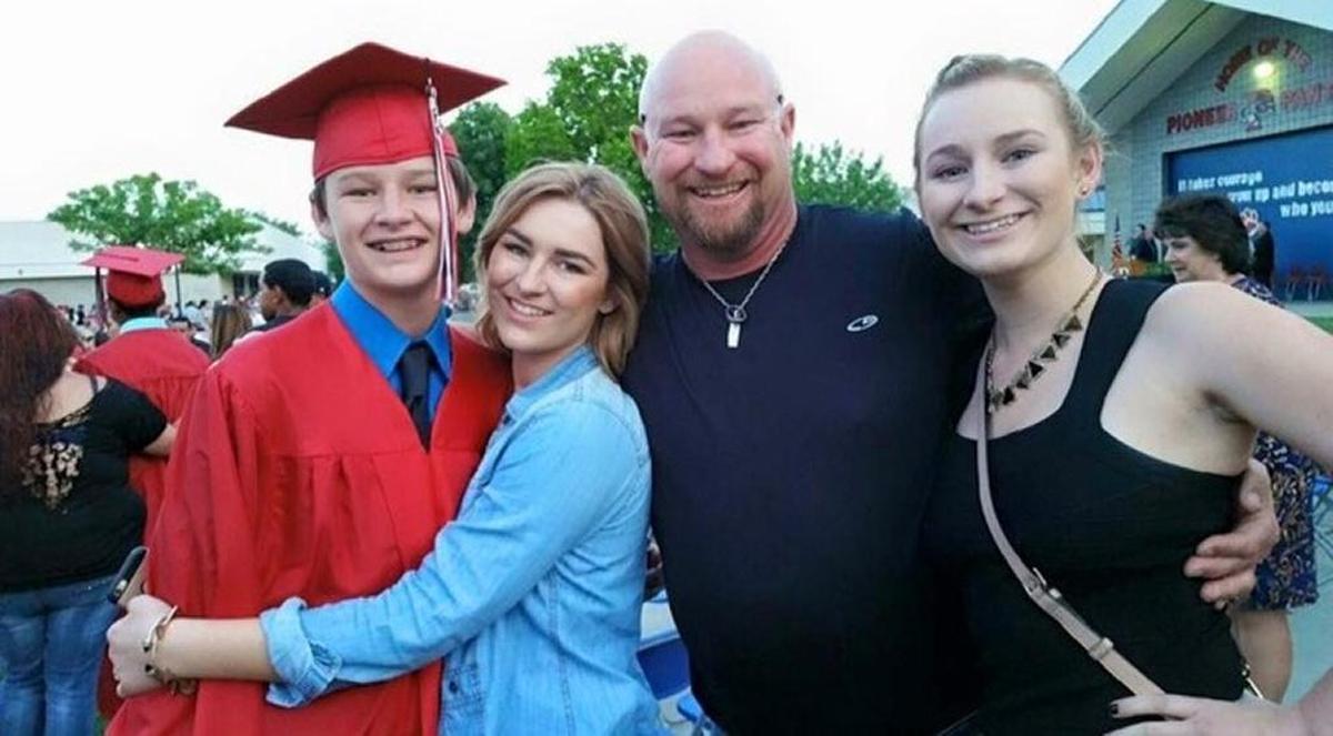 Kevin Blake Willard, center, with his children, from left, Blake, Bailey and Brooke.
