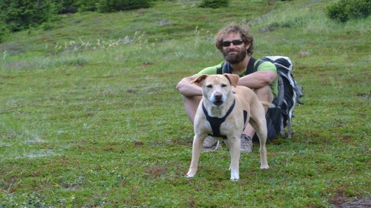 John Barraco and his dog, Mr. Chili, during a hike in Arkansas.