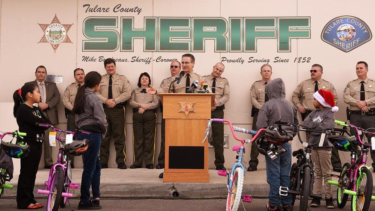 Tulare County Sheriff Mike Boudreaux welcomes guests to the PAL Bike Giveaway and Holiday Open House in December 2016. But a recent letter to the sheriff from the ACLU contends his jail staff is not providing proper care to pregnant inmates in the jail. It is a charge he strongly denies.