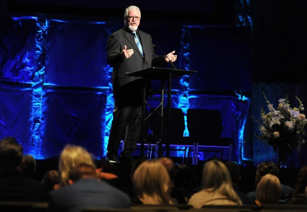 Rev. Jeff Harrington talks about Mark Gassett during his Celebration of Life service at New Covenant Community Church, Tuesday morning, April 25, 2017. Gassett was killed in last week’s rampage shooting.