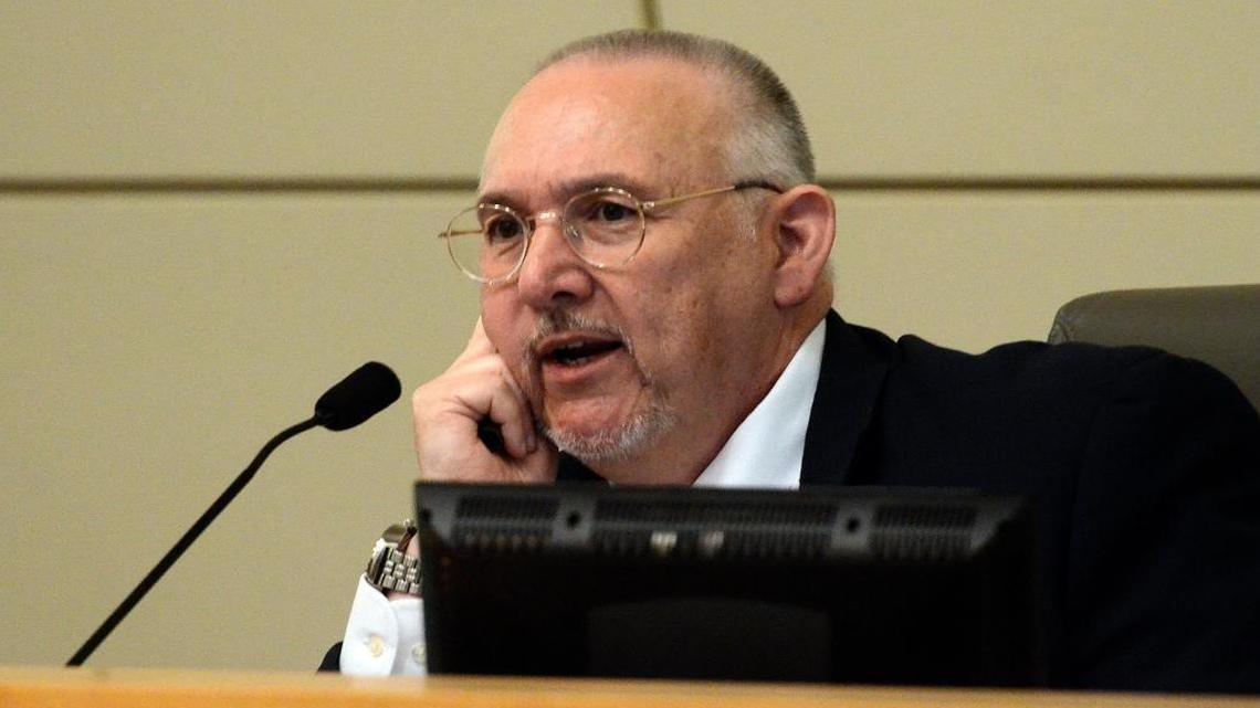 Michael Flores, the independent hearing officer, oversees a September hearing concerning code violations at the Summerset Village Apartments.