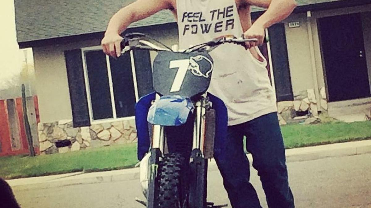 Dylan Noble, who loved to ride, pushes a BMX bike.