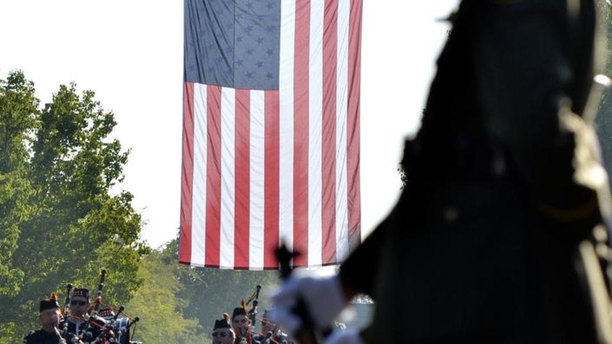 
Clovis firefighters pipes and drums march while playing during the 9/11 remembrance ceremony held at Pelco by Schneider Electric on Sept. 11, 2014 in Clovis.
