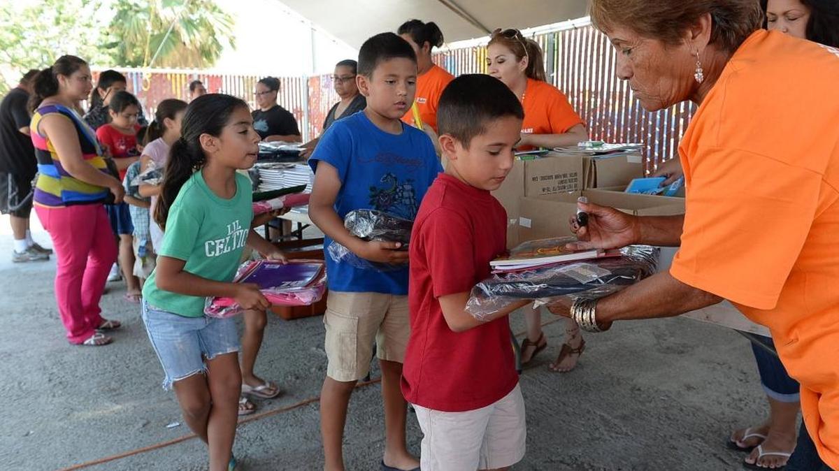The scene at the 2013 Mendota backpack giveaway.