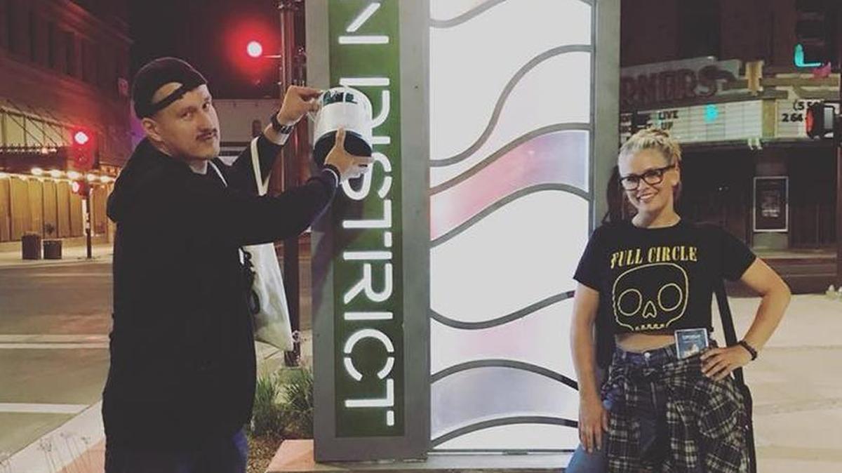 A downtown business owner dressed up as the Fulton Street vandal on Halloween and posed for photos with Dallas Blanchard on the newly opened street.