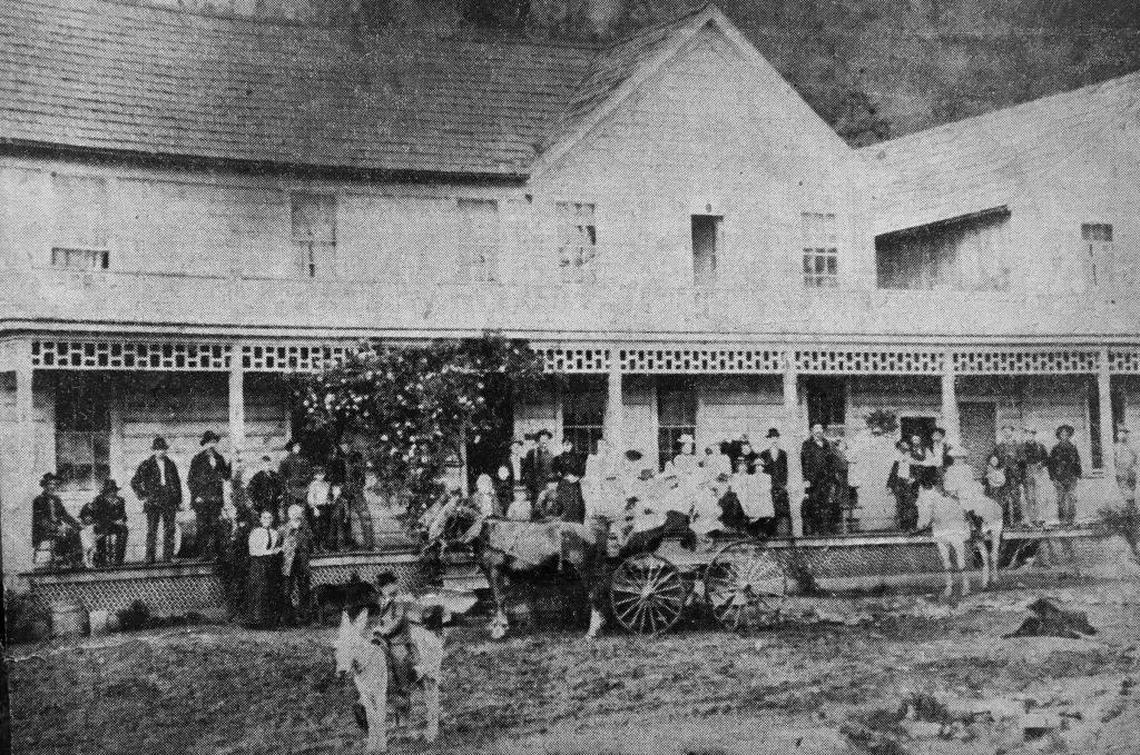 This picture shows the opening of Thomas Hotel in Grub Gulch in 1891. This is where President Theodore Roosevelt stopped in 1903 on his way to Yosemite. Note the large rose bush at left; descendants of the bush live on in Murphys and Oakhurst.