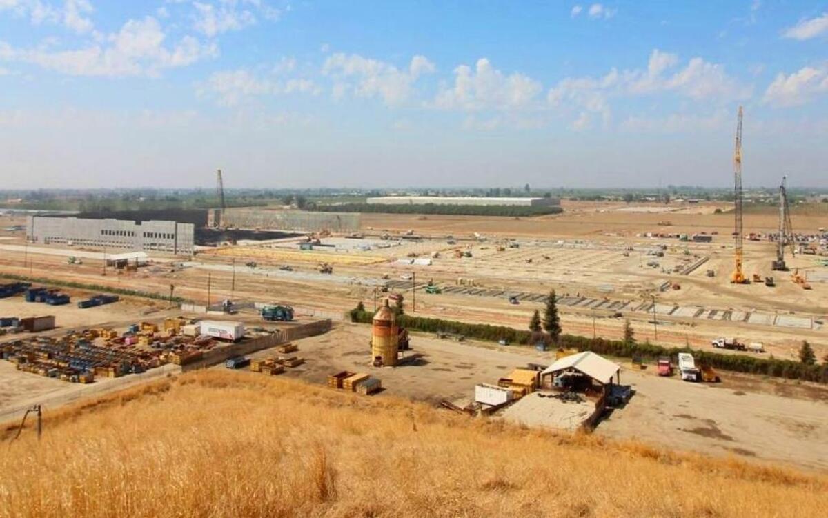 A construction-site webcam shows work underway on Amazon’s new order-filling center in south Fresno. A new Ulta Beauty distribution center is being built to the west and is visible in the distance.