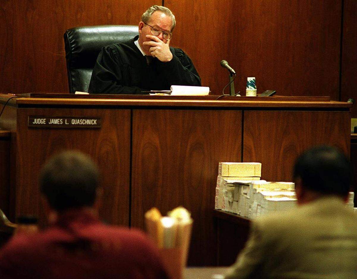 Judge James Quaschnick presides over a trial.