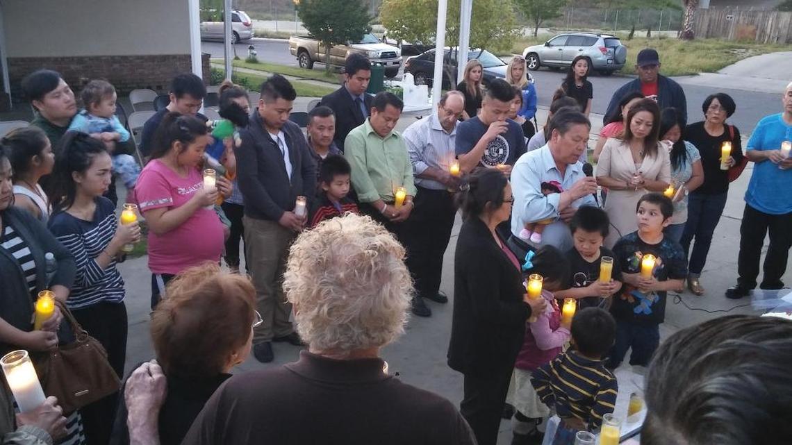 Local Hmong leaders and the family of Xia Vang, who allegedly was killed by her husband earlier this month, held a candlelight vigil at the family’s home in east-central Fresno on Friday night.