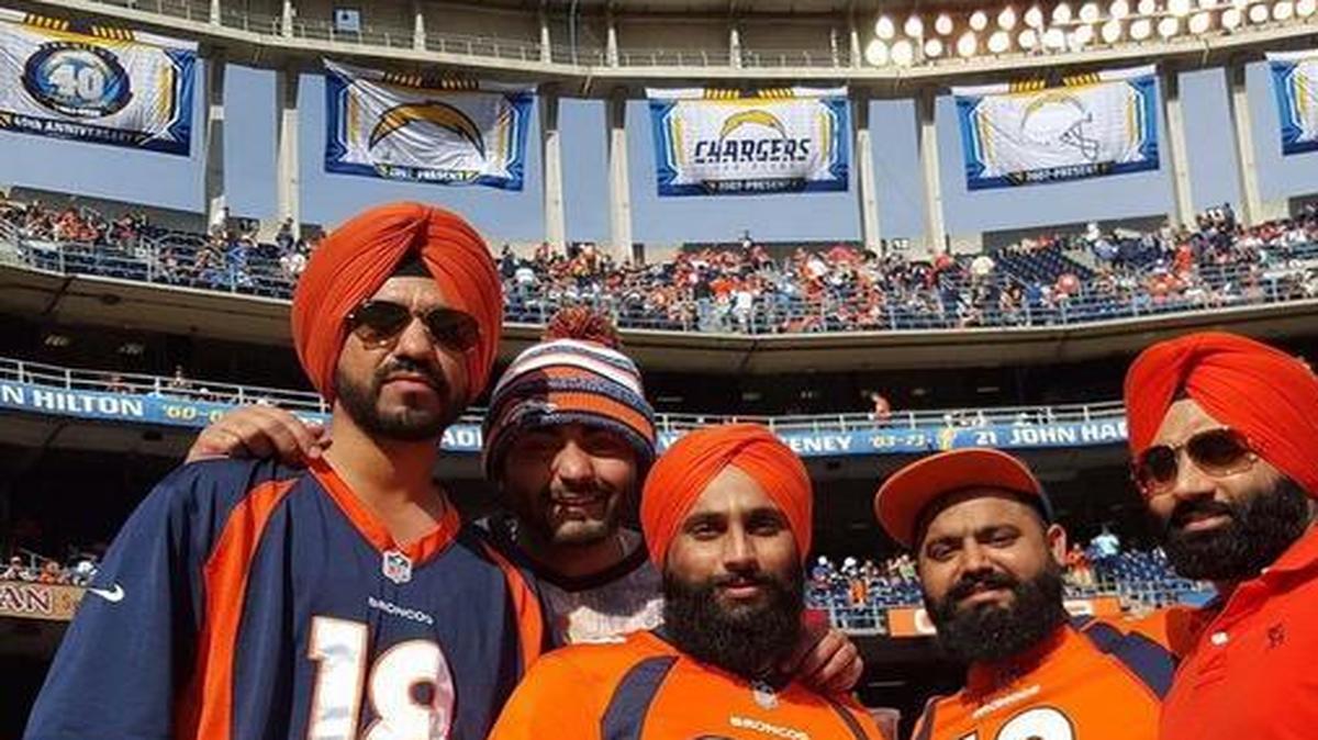 From left: Gurdeep Singh, Pavitar Singh, Amrinder Singh, Varinder Mahli and Amandeep Singh Randhawa, all of Fresno. The three men wearing turbans were hassled by security at Qualcomm Stadium in San Diego while trying to enter a football game Dec. 6.