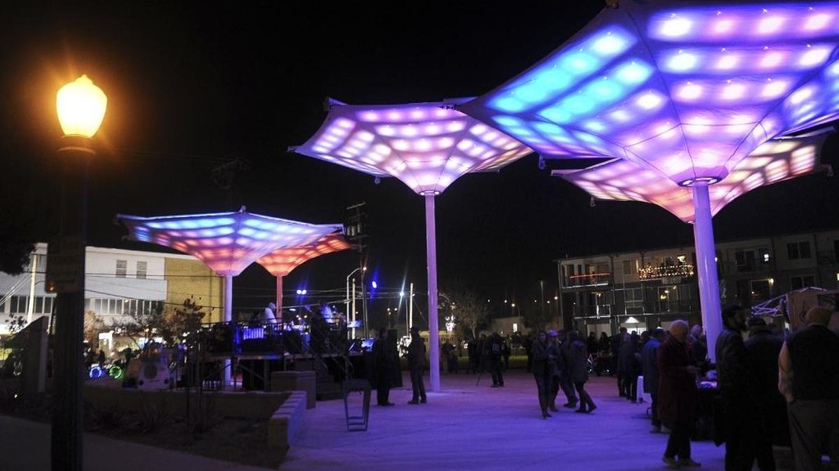 The grand opening of the new Cultural Arts District Park, located at Calaveras and Fulton Streets, was held Thursday, Dec. 1, 2016 in downtown Fresno, Calif. The large upright structures feature motion-controlled lighting.