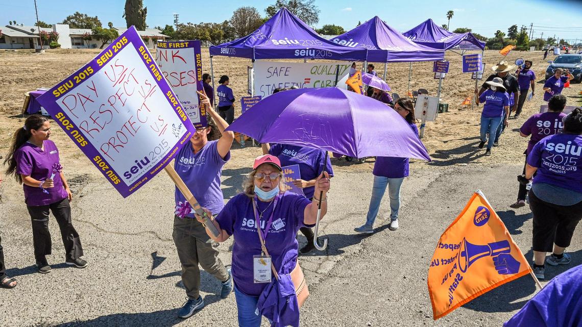 Nursing home workers hold a one-day strike outside Sunnyside Convalescent Hospital on Wednesday, Sept. 21, 2022.