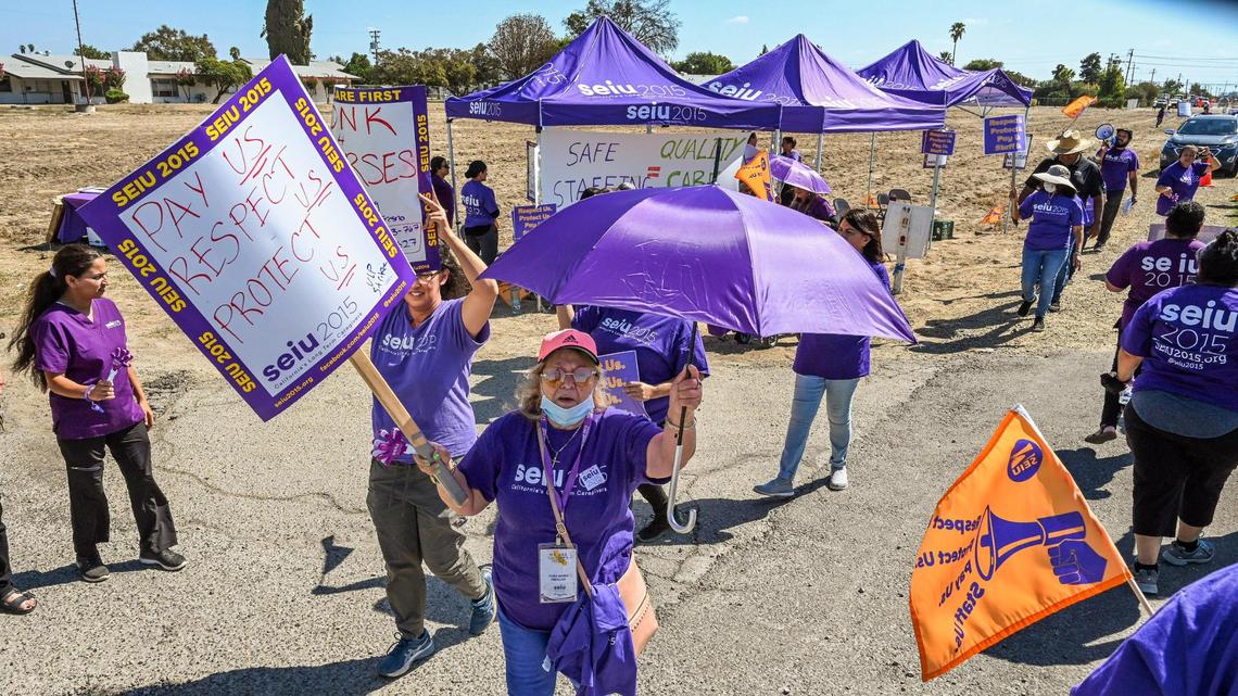 Nursing home workers hold a one-day strike outside Sunnyside Convalescent Hospital on Wednesday, Sept. 21, 2022.