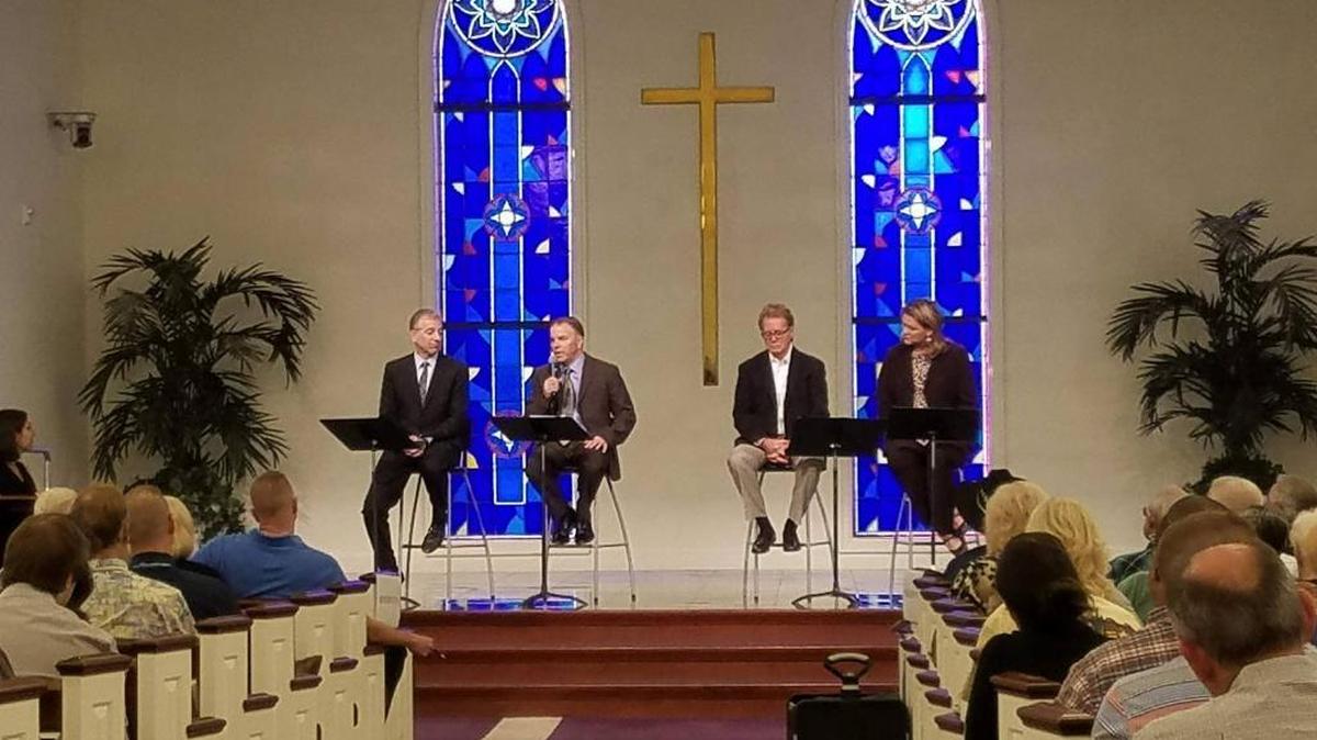 From left, panelists Dr. Peter Abaci, Dr. Michael Habibe, PAIN founder Flindt Anderson and Fresno County District Attorney Lisa Smittcamp discuss prescription drug abuse during a town hall meeting at The People’s Church in northeast Fresno, California on Monday, Oct. 9, 2017.