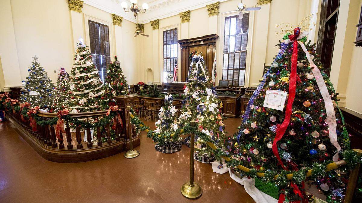 Christmas trees are shown filling the old county courtroom at the annual Christmas Open House at the Merced County Courthouse Museum in 2016.