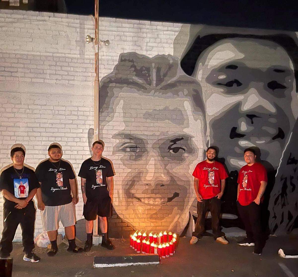 Logan Morales’ family and friends held a vigil in front of his portrait on Omar ‘Super’ Huerta’s original mural in Fresno.