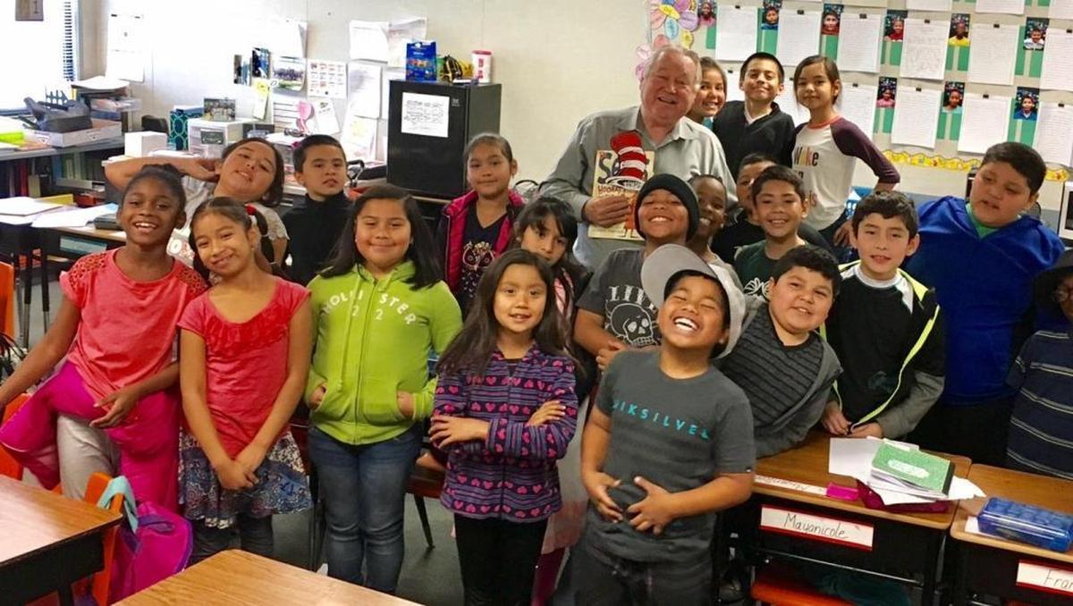Jim Boren volunteering in a third grade class at Kirk Elementary School in west Fresno for Read Across America Day in March.
