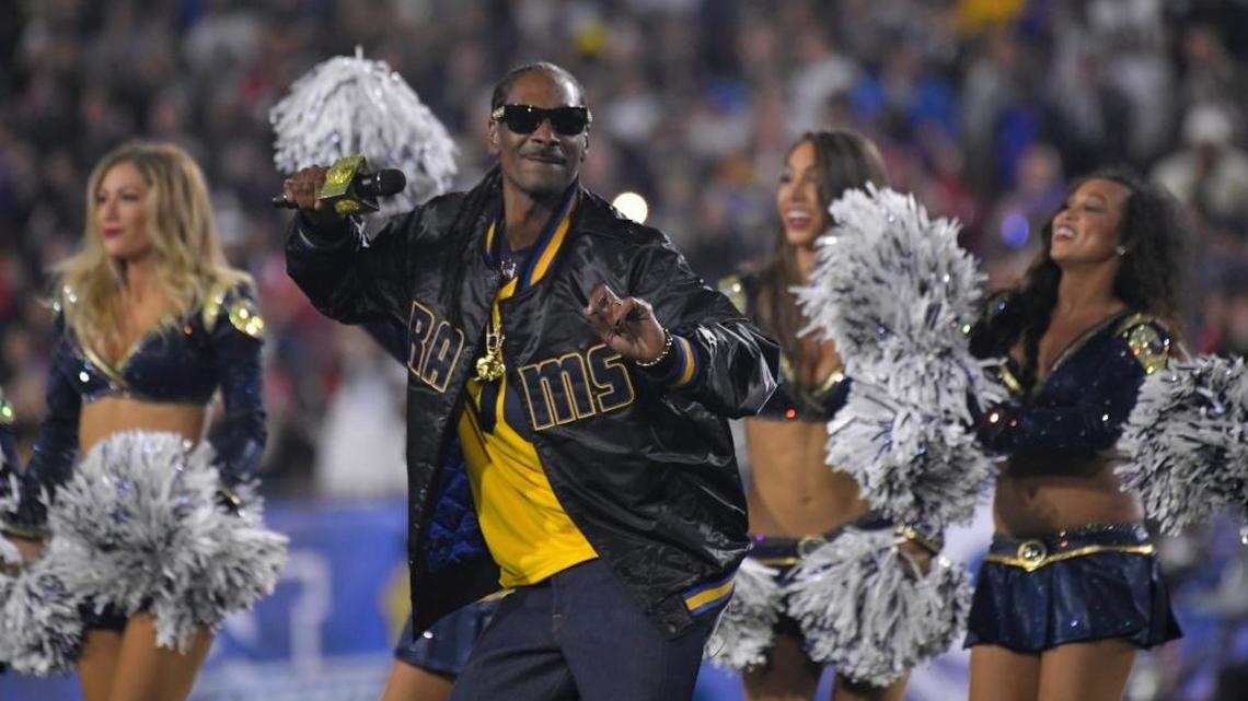Rapper Snoop Dogg performs with the Los Angeles Rams cheerleaders during halftime of the NFL wild-card playoff game against the Atlanta Falcons on Jan. 6 in Los Angeles. He is one of the headline acts set for the two-day Grizzly Fest at Fresno’s Woodward Park in May 2018.