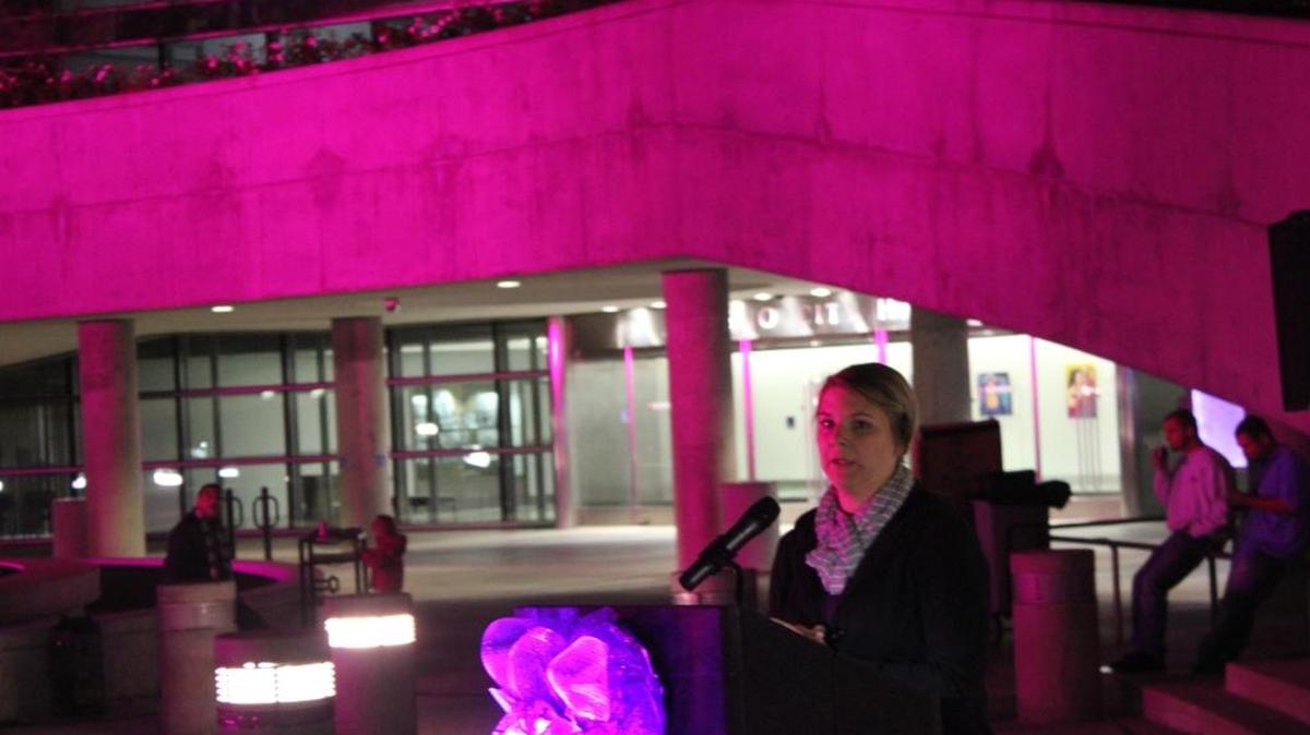 Andrea Powell speaks outside Fresno City Hall Tuesday on her experiences as a mother of a premature baby.