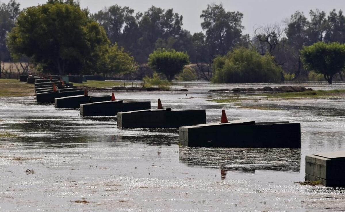 The Kingsburg Gun Club is flooded by the Kings River Saturday, June 24, 2017, near Kingsburg, Calif.
