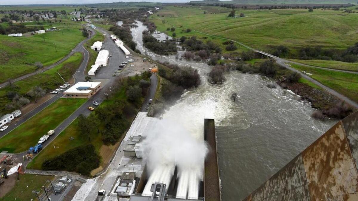 Millerton Lake water released from Friant Dam Feb. 10 into the San Joaquin River. An exceptionally wet winter has allowed the federal Bureau of Reclamation to give many Central Valley Project contractors a full allocation of water for the first time in years.