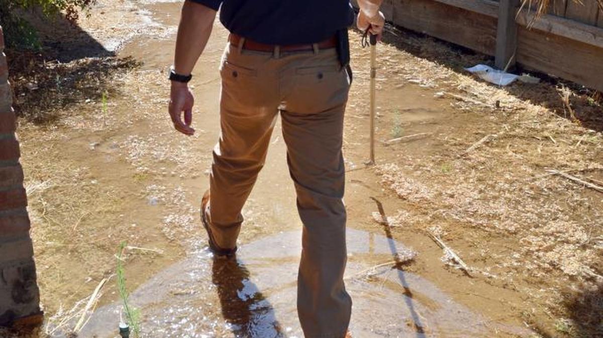 
Fresno water conservation representative Tou Moua in Fresno. Moua patrols the north side of Fresno looking for people who are watering illegally. Moua says the drought has his office of four permanent employees and some seasonal temporary help stretched thin in responding to and investigating calls from the community reporting  water wasters.
