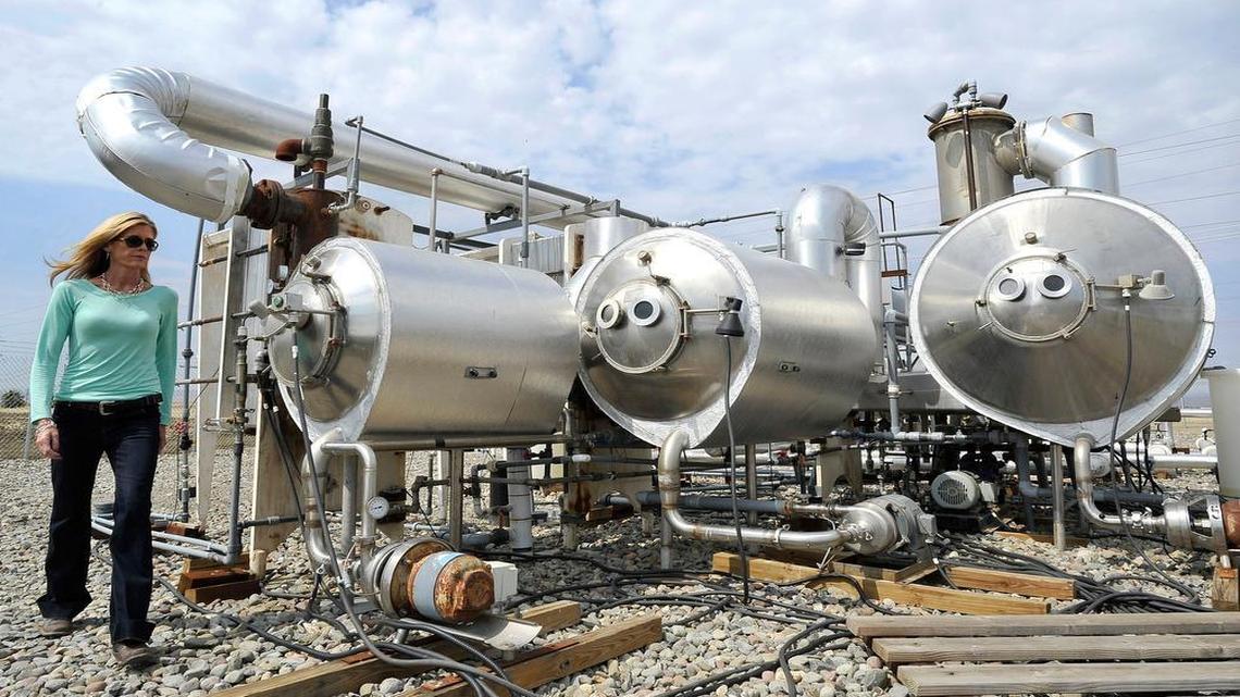
Betty Hurley Lindeman of Panoche Water and Drainage District passes the WaterFX demonstration plant near Firebaugh, which uses solar energy to treat irrigation runoff.

