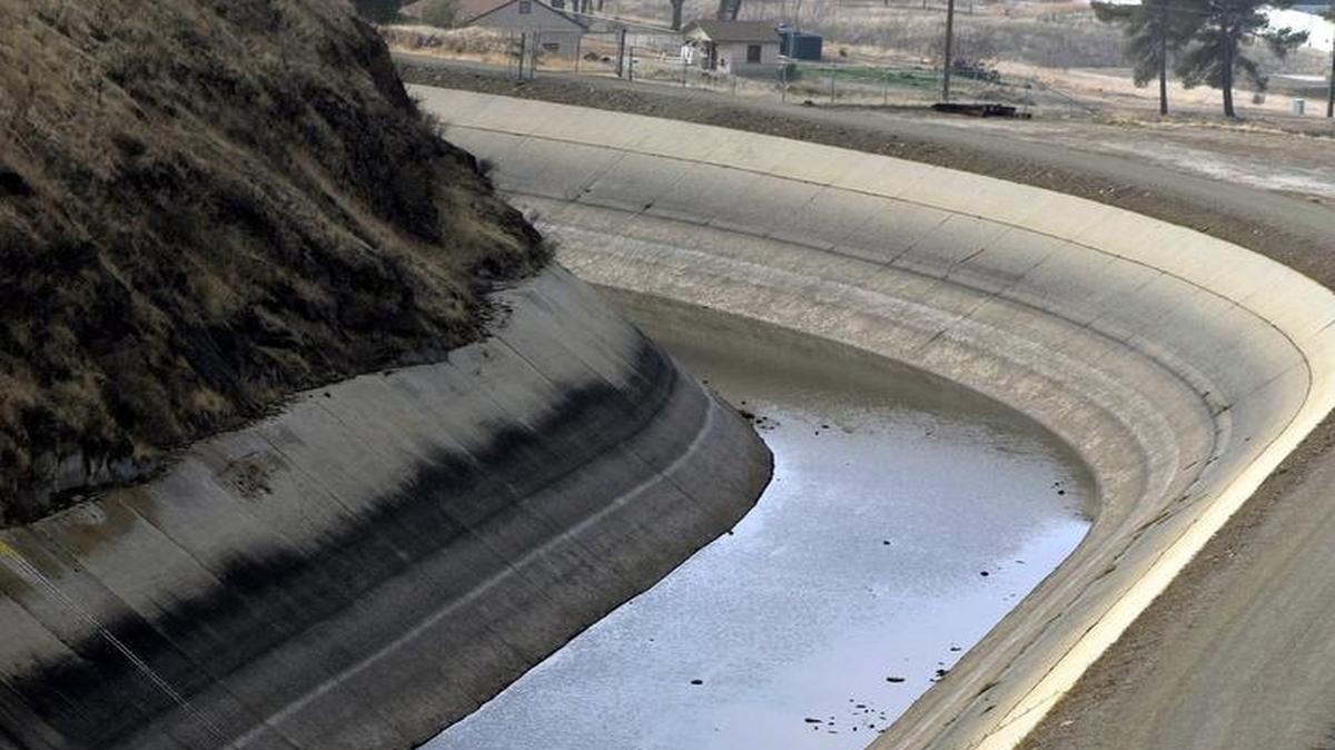 
The Friant-Kern Canal below Friant Dam in January 2014. In the citrus belt on the east side of the San Joaquin Valley, 15,000 farmers rely on river water delivered via the canal for irrigation.
