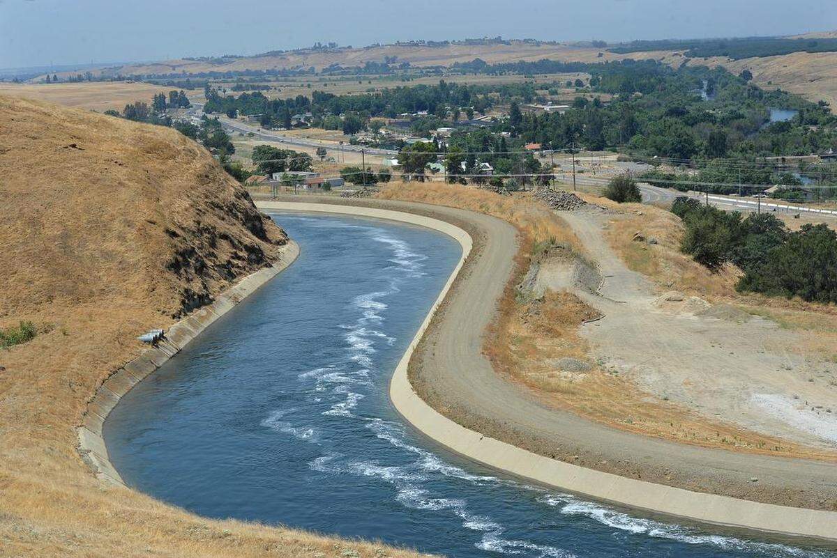 Water from Millerton Lake fills the Friant-Kern Canal below Friant Dam in this file photo from 2018.