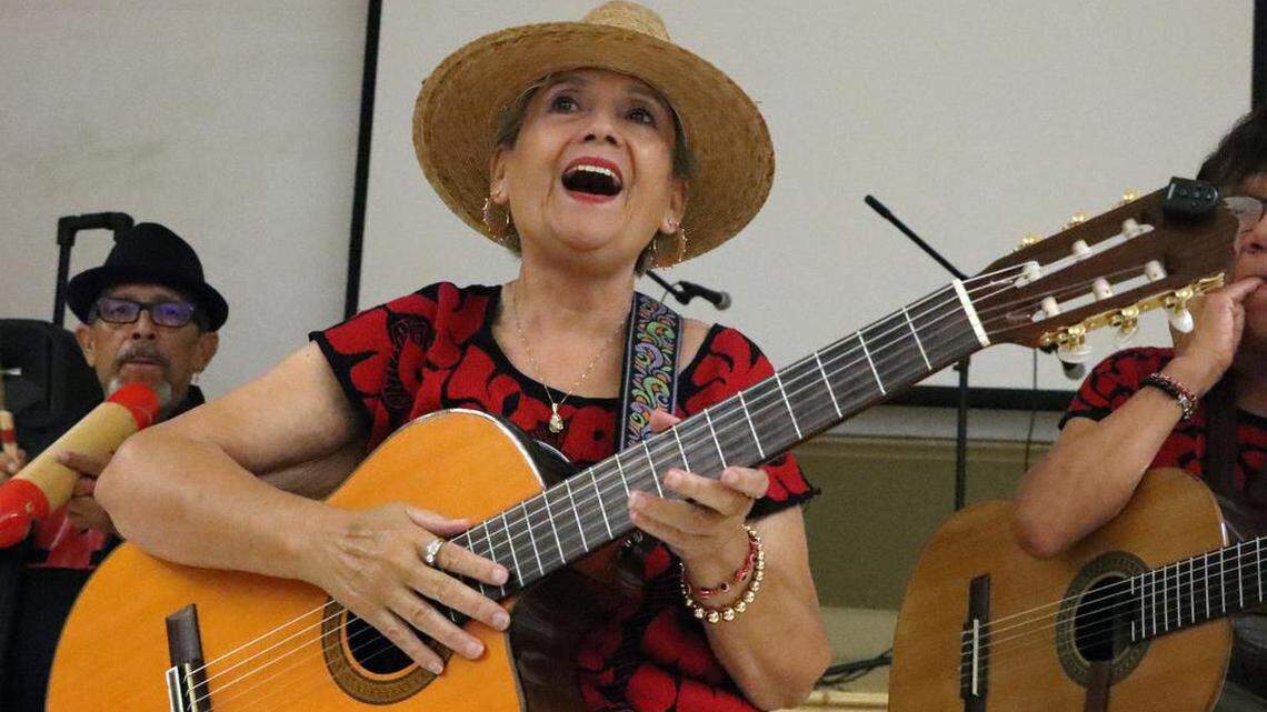 Delia Salas of Mujeres Valientes sings ‘De Colores’ during a 50th anniversary commemoration of the United Farm Workers grape strike at Fresno City College on Aug. 19, 2023.