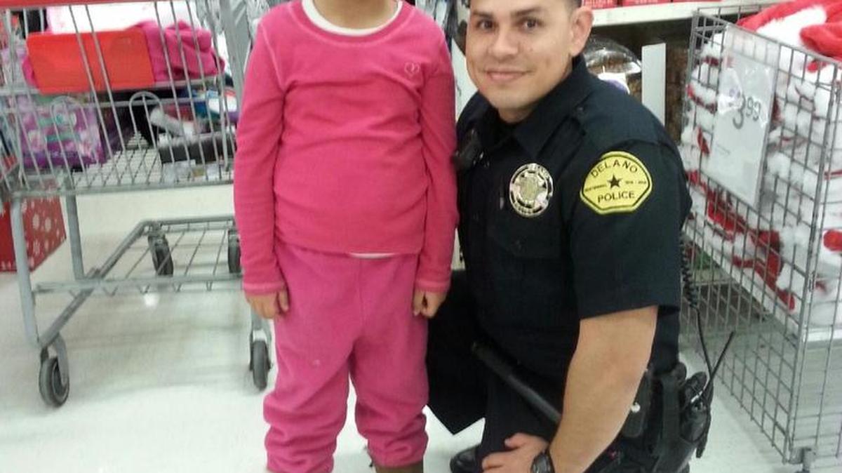 Delano Police Officer Mark Morales, shown during the Delano Police Department’s “Shop with a Cop” event, will accompany Congressman David G. Valadao to Washington D.C. for the Jan. 12 State of the Union address.