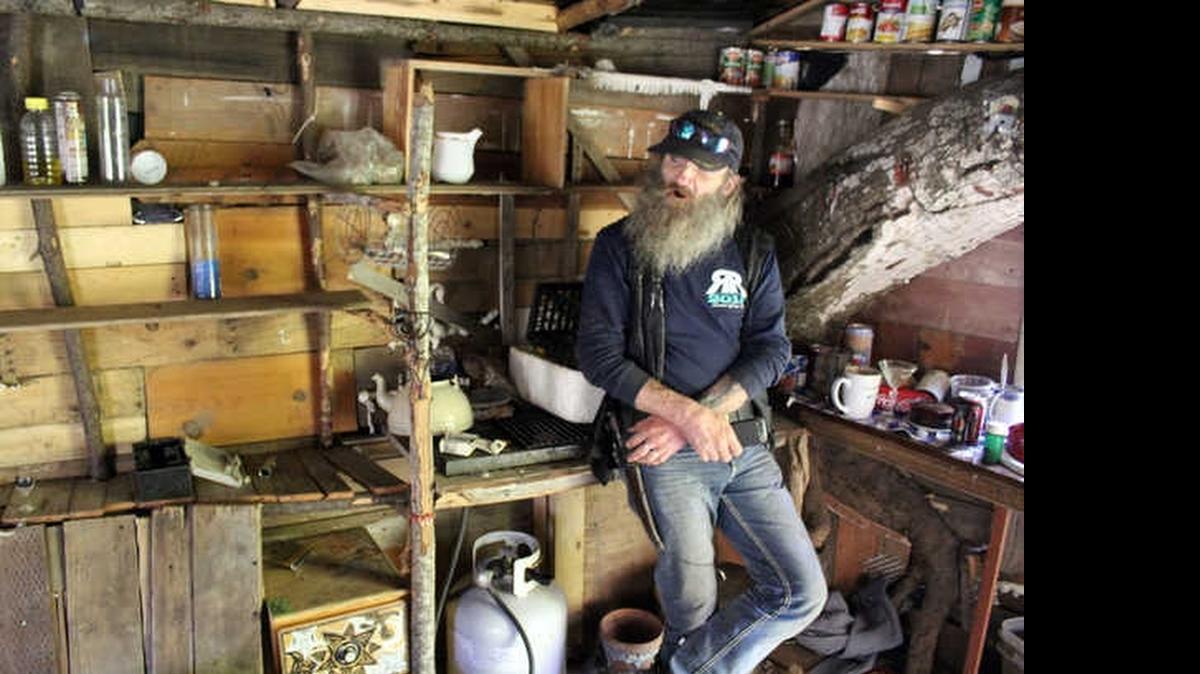 
Ed Tolosko stands in part of an illegal encampment in Fern Canyon, just west of Highway 1 in Cambria, on Monday. Tolosko said he was clearing some belongings he said he’d loaned one of the occupants, whom he described as his adopted son. “I thought when he borrowed this stuff from me, he was just going to go camping for a little bit,” Tolosko said. “I didn’t know he was going to do this.”
