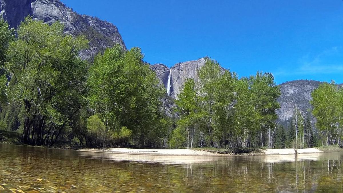 

The Merced River flows through Yosemite Valley and past Upper Pines campground, where two children died Friday, Aug. 14, 2015 after a tree limb fell on their tent while they were sleeping.
