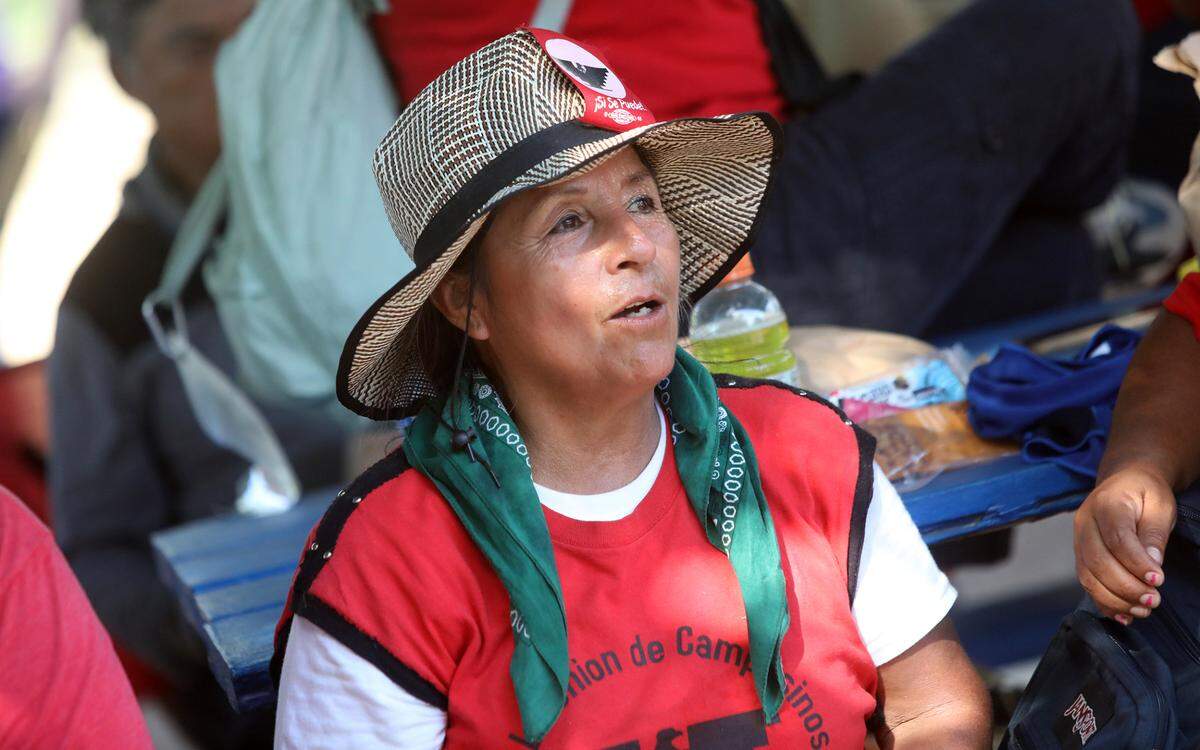 Lourdes Cárdenas rests at Calwa Park on Aug. 11, 2022. The 24-day march is slated to end Friday in Sacramento.