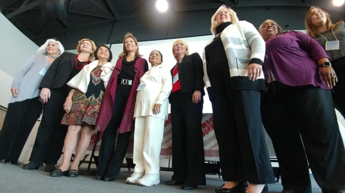Several women stand on stage at Fresno State’s North Gym on Saturday, Dec. 9 during a human rights event honoring women’s rights. Among the featured women is Dolores Huerta, farmworkers rights leader who is third from left, and Amanda Renteria, chief of operations for the California Department of Justice, fourth from left.