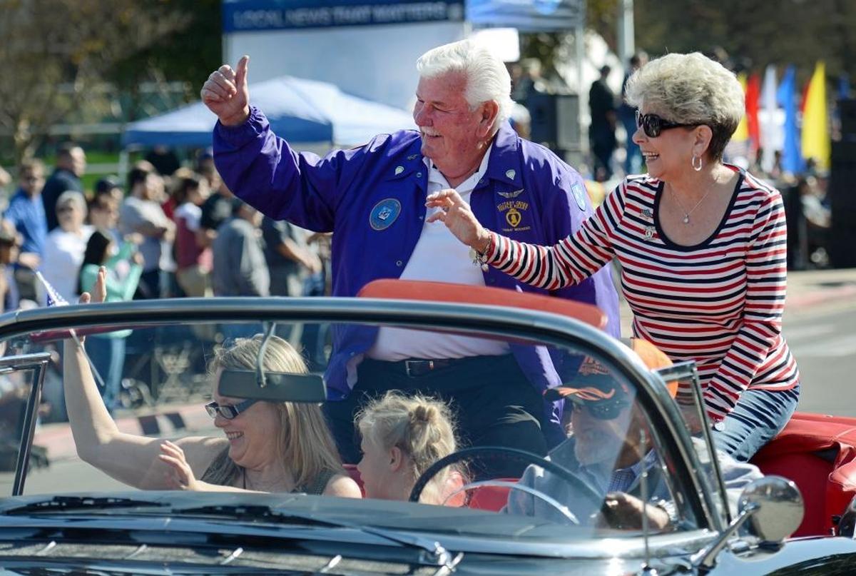 U.S. Army veteran and Purple Heart recipient Bob McLaughlin, who served during the Vietnam War, waves with his wife Debbie during the start of the annual Veterans Day Parade in downtown Fresno on Saturday, Nov. 11, 2017. McLaughlin served as grand marshal of this year’s parade.