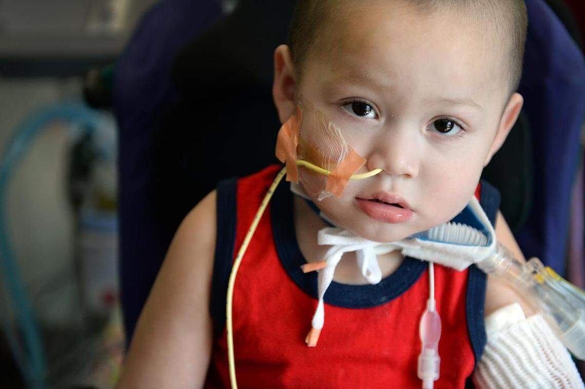 Ramiro "Gino" Padilla, 2, of Modesto, sits in his wheel chair before going through physical therapy, at Valley Children's Hospital on Friday, Feb. 23, 2018. Gino suffers from transverse myelitis which is an inflammation of the spinal cord and causes partial paralysis and pain. Pain medications such as opioids were used to treat the pain at first but a gradual weaning off of those medications has been carried out through pain management to prevent addiction.